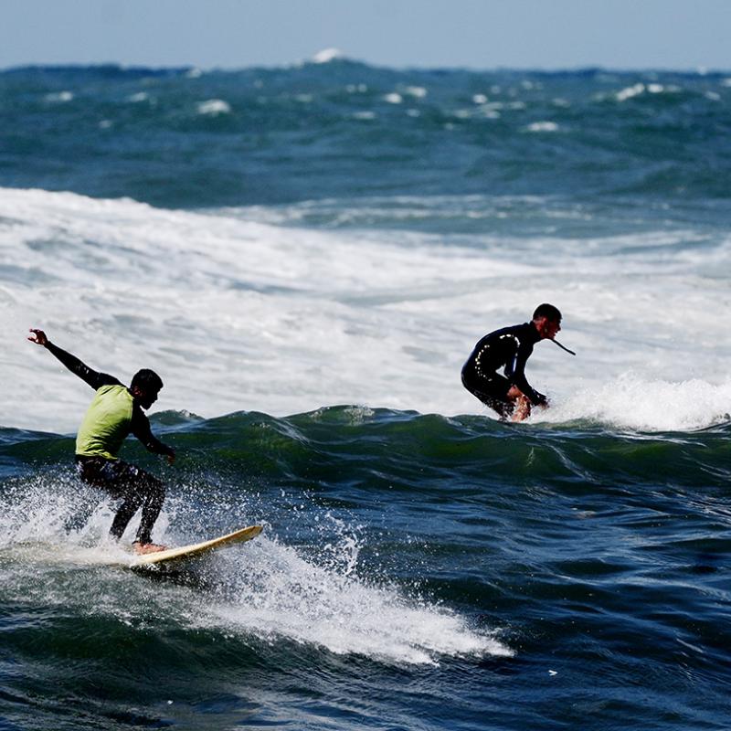 Surfers still take to the waves in war-torn Gaza