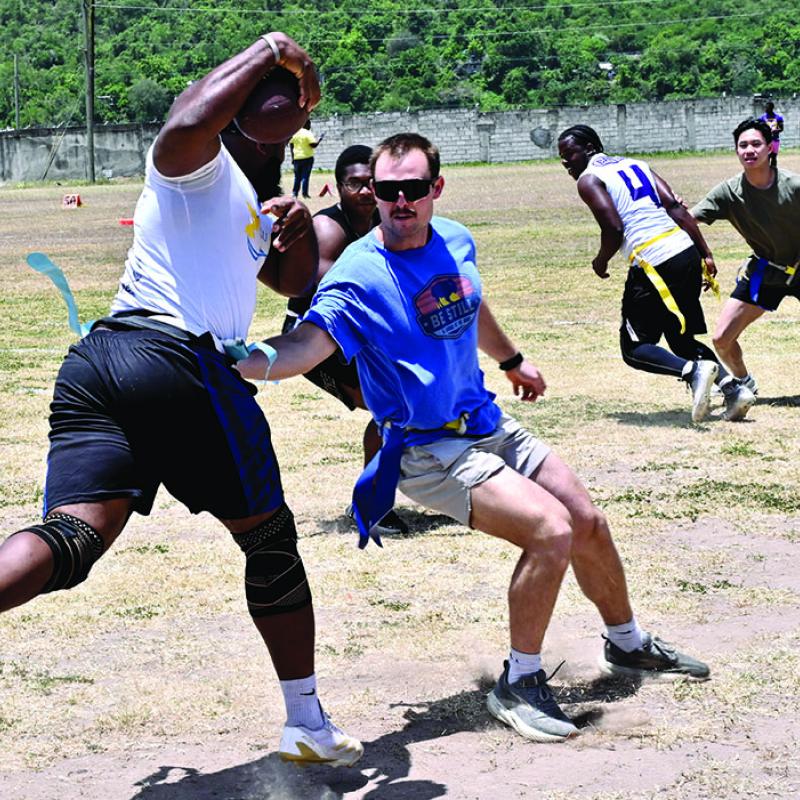 National flag footballers clip US Navy