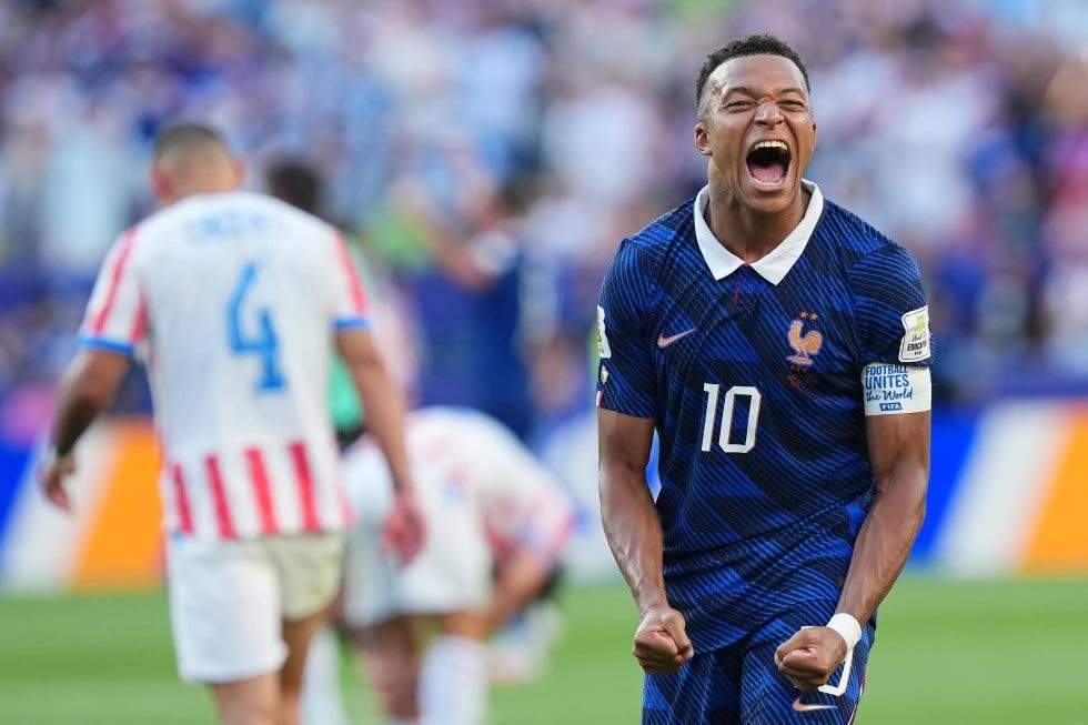 France’s Kylian Mbappé (10) celebrates his team's victory at the end of the World Cup round-of-16 football match against Paraguay in Philadelphia on Saturday.