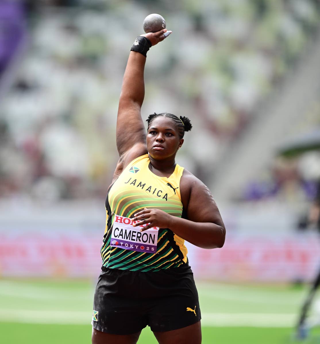 LEFT: Llydricia Cameron gets ready to perform during the women’s shot put qualifiers at the World Athletics Championships in Tokyo, Japan. Cameron managed a throw of 17.77 metres, which was not good enough to advance.