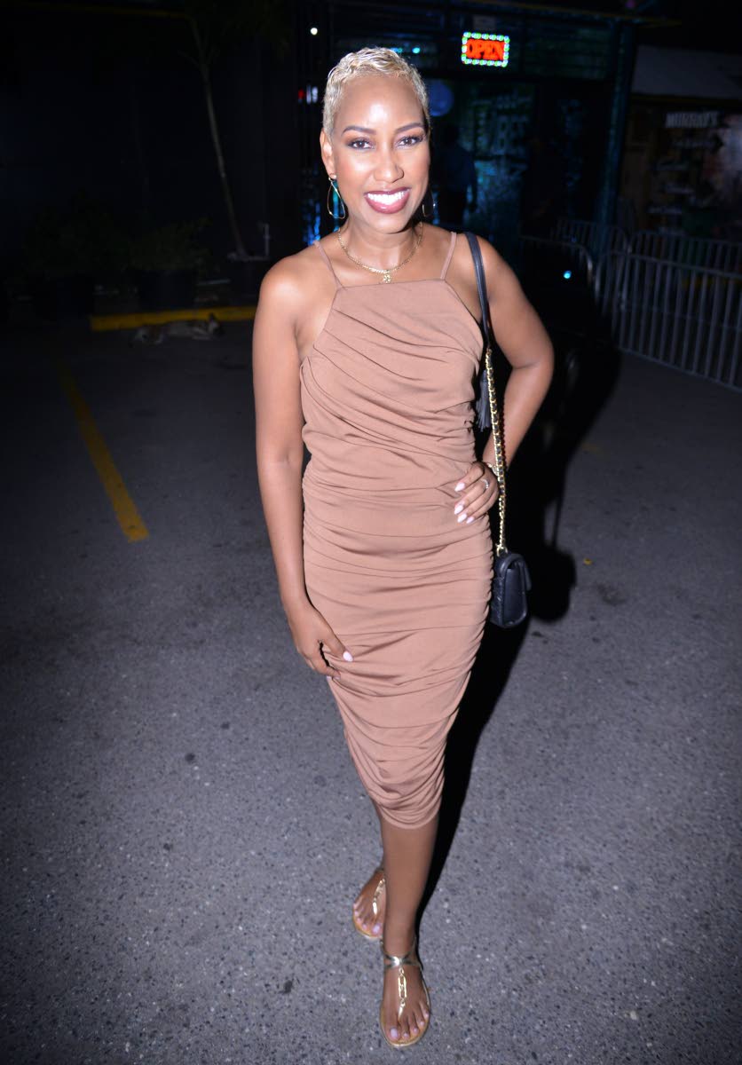 Usually serving gems, Money Media’s Kalilah Reynolds serves a look in her ruched neutral midi and cropped blonde tresses.