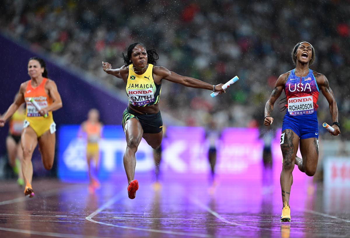 Jonielle Smith of Jamaica (centre) on the anchor leg of the women’s 4x100 metres on yesterday’s final day of the 2025 World Athletics Championships in Tokyo, Japan. The United States, with Sha’Carri Richardson (right) on the final leg, won in 41.75 s