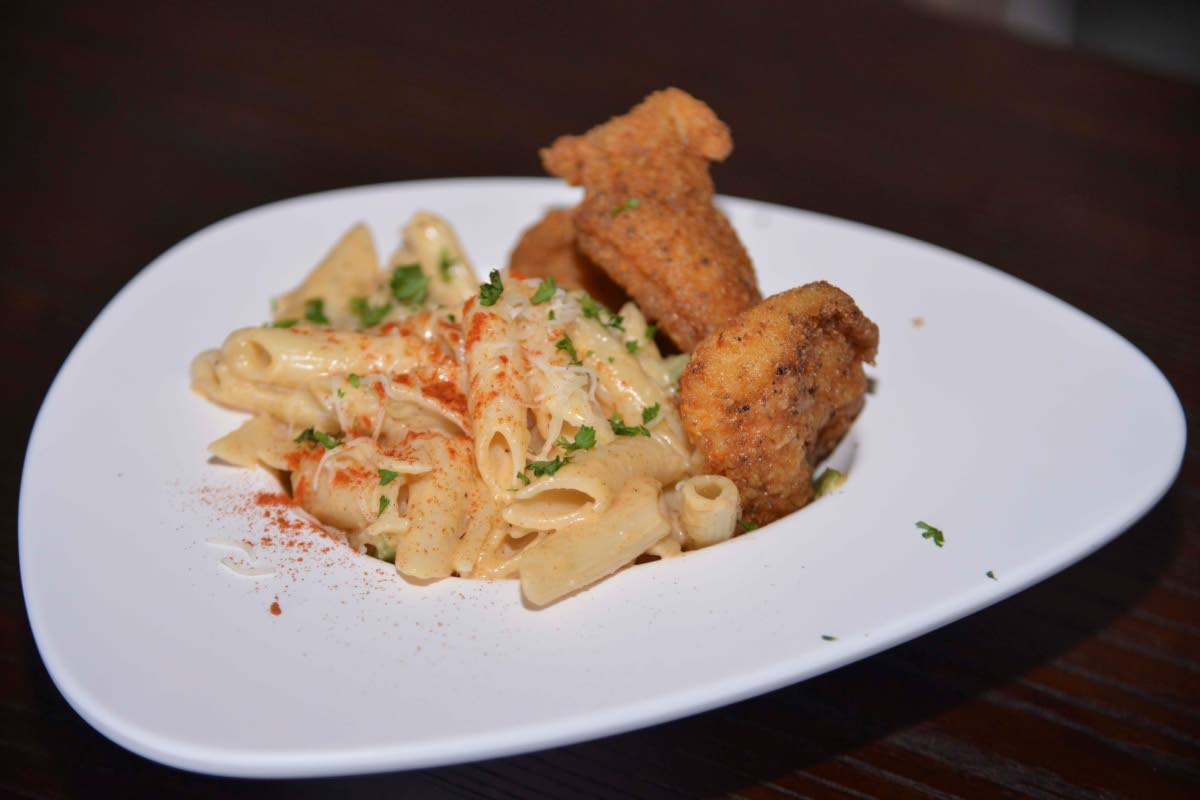 The basa fish fillet pasta at Azi’s Pasta Plates combines tender, flaky fish with creamy pasta. 