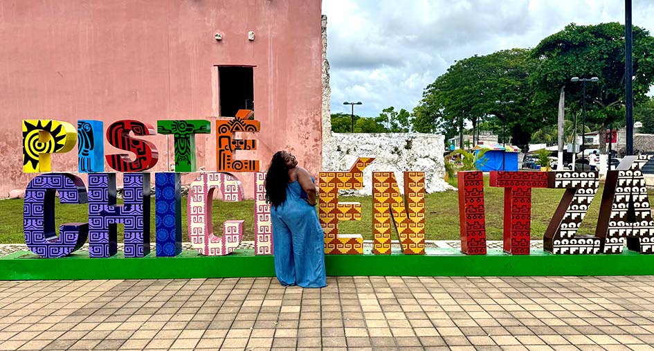 Dania Beckford takes on the adventures of Mexico, capturing a priceless picture moment at the famous Chichén Itzá sign.