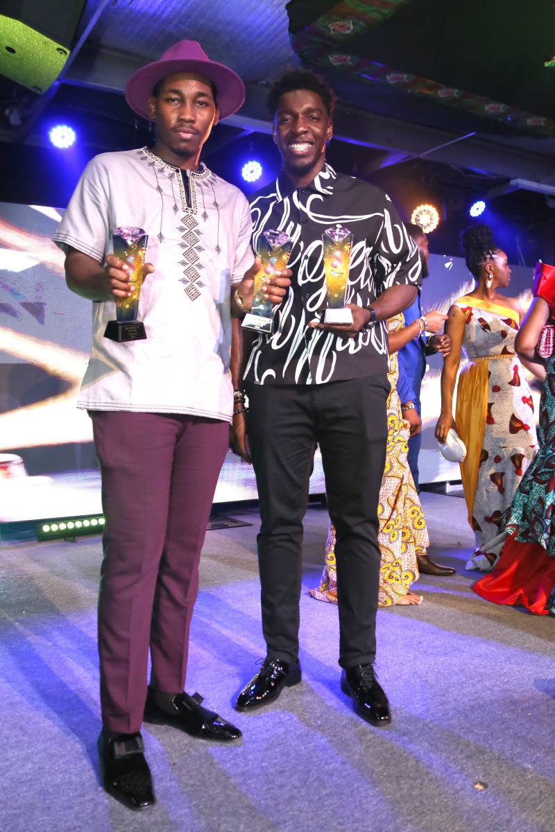 Prince Saj (left), Male Artiste of the Year and winner of Collab of the Year for ‘Nuh More Dan Wi’ with Johnmark Wiggan. 