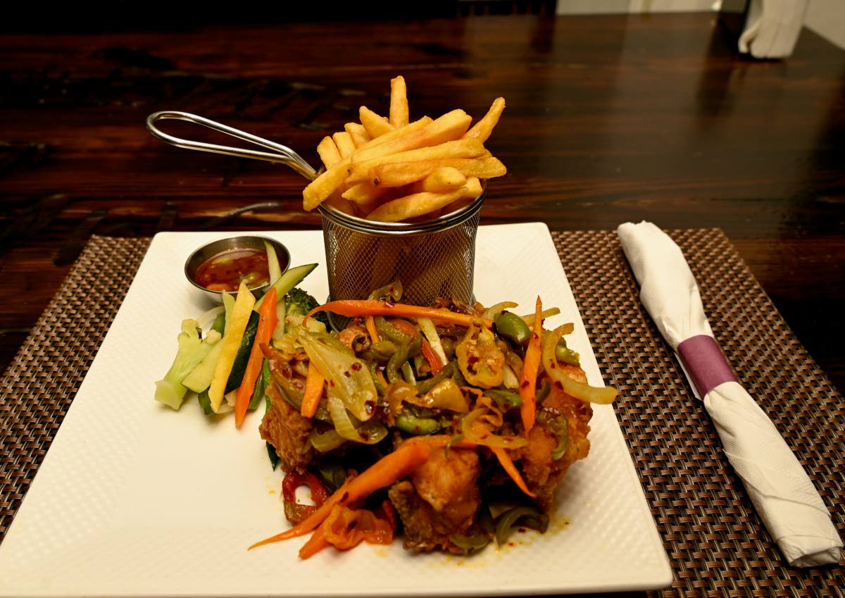 Escoveitch snapper fillet, served with fries.