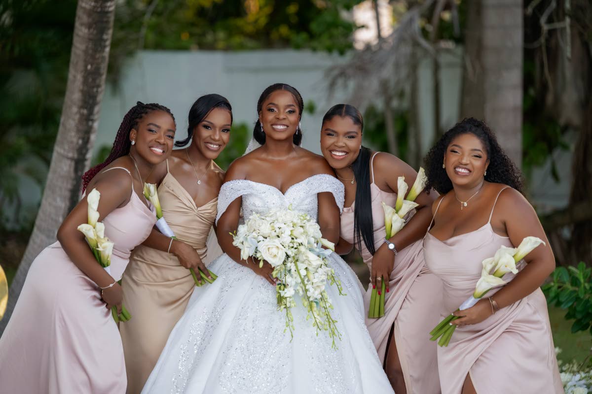 Sherona (centre) and her beautiful bridal party (from left) Joelle Notice-Barnett; maid of honour Shanna-kaye Forrester; Britney Getfield and Zaneek Wright.