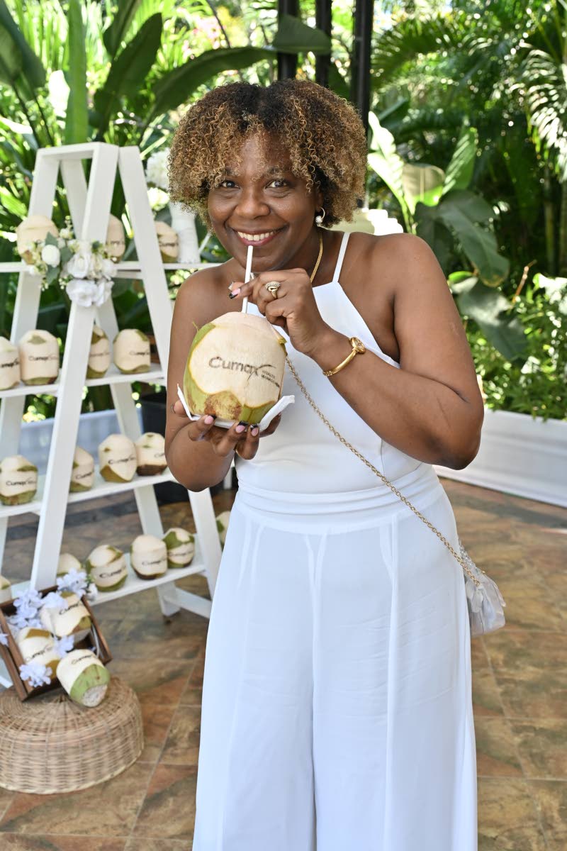 We snapped Marcia Osborne, group human resource and administration manager, mid-sip as she happily enjoys a refreshing coconut.