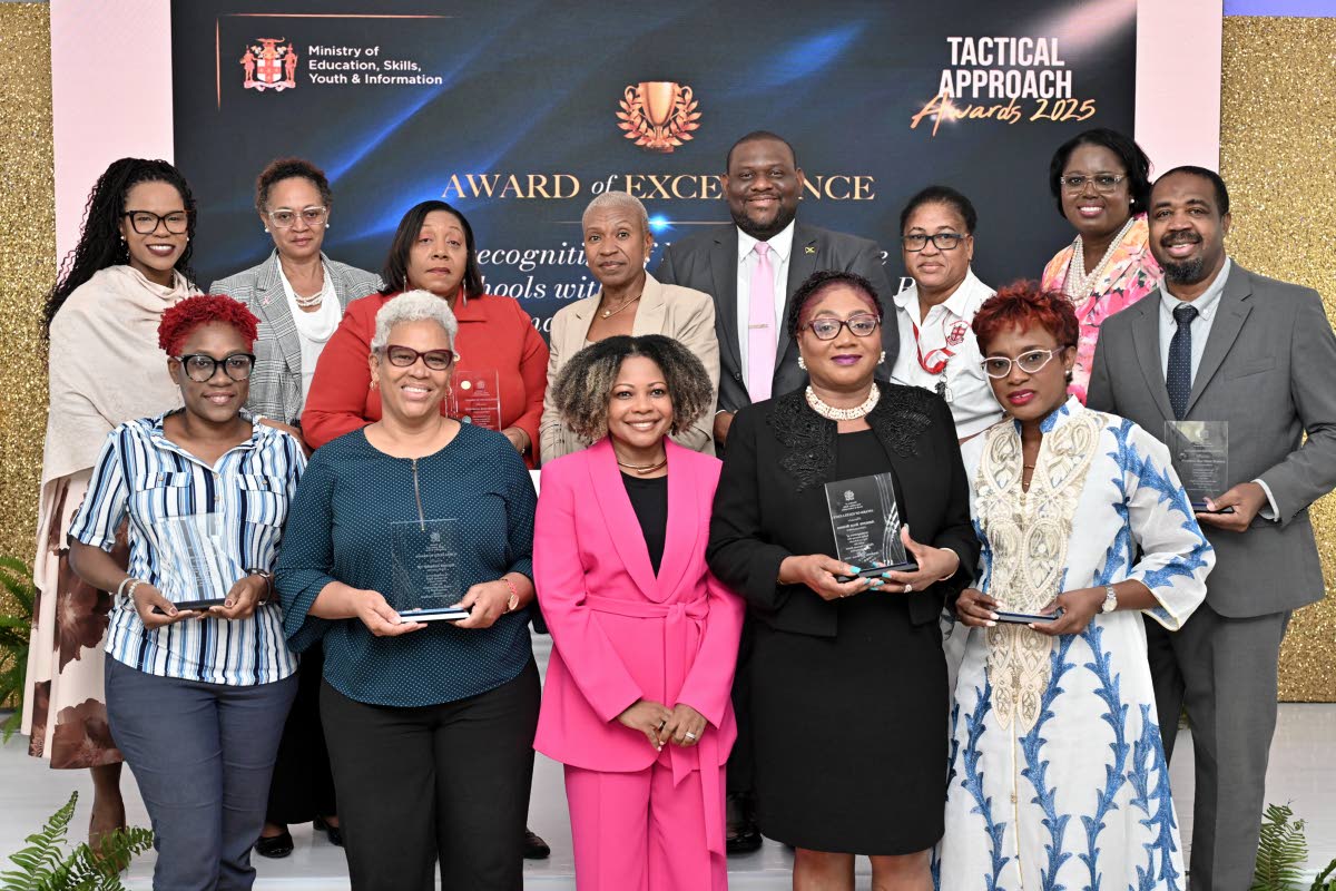 Senator Dr Dana Morris Dixon (centre), minister of education, skills, youth and information and Dr Kasan Troupe (back row, left), permanent secretary in the ministry, pose with the principals after presenting Tactical Awards to them at the Tactical Approac