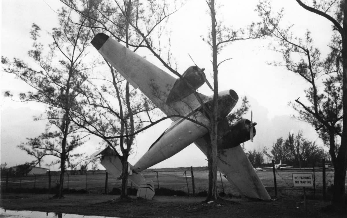 A plane rests on trees at the Norman Manley International Airport in Kingston, following the passage of Hurricane Gilbert in September 1988.