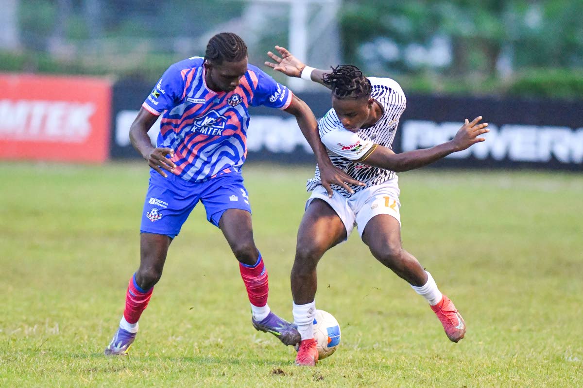Rashaun Small (left) of Portmore United battles for the ball with Cavalier’s  Denzel McKenzie  during their Jamaica Premier League match  at the Stadium East field on October 12. Portmore won 4-2.