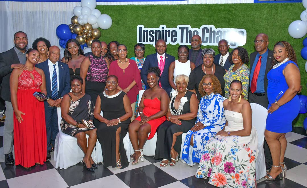  Members of the Kiwanis Club of West St Andrew, along with executive members of Kiwanis International, following the installation ceremony for the club’s new administration, held at the Terra Nova All-Suite Hotel. The new administration is headed by Maur