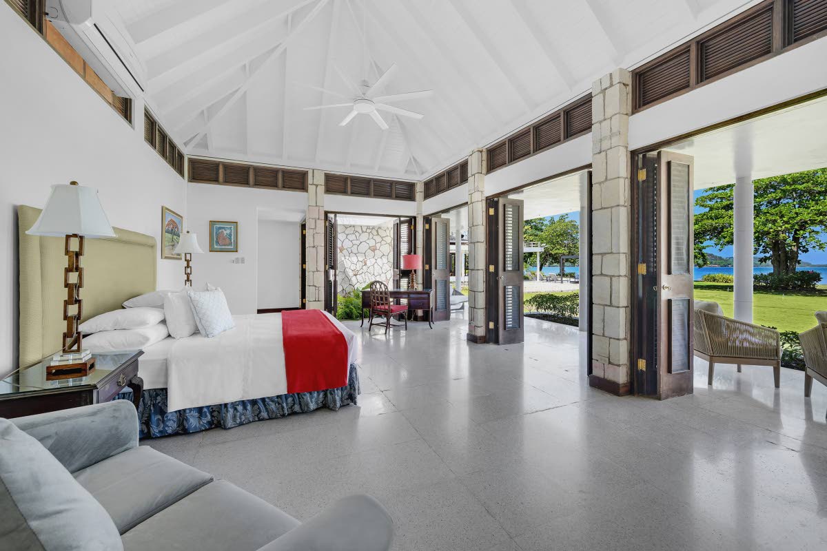 A one-of-a-kind primary bedroom, blending the indoors with outdoors.