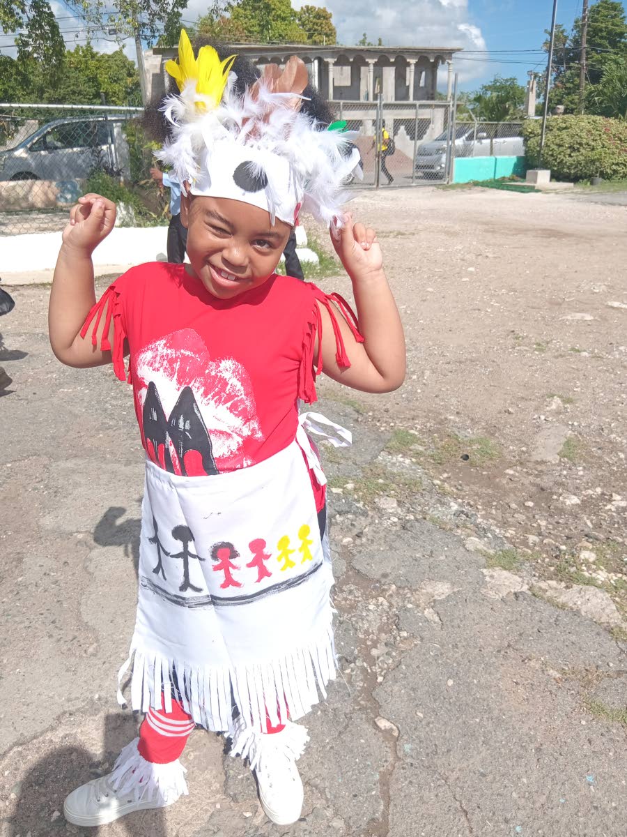 Sanay Green poses as an Indian chief during Heritage Week activities at Harrison’s Preparatory on October 15.