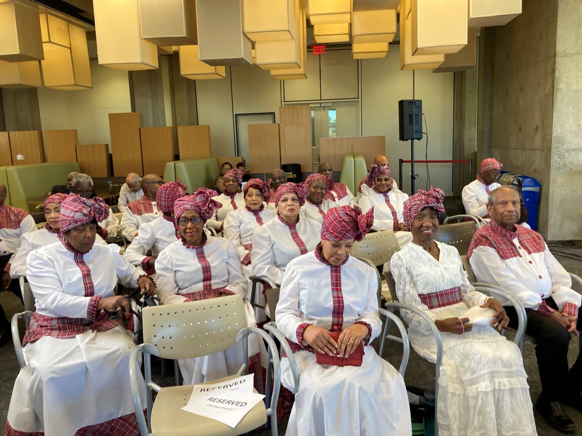 Hertiage Singers Canada seated before a peformance at the exhibit titled ‘Heritage Singers Canada: A Legacy of Caribbean Folk Music, Culture, and Community’ which ran from September 15 to October 16.