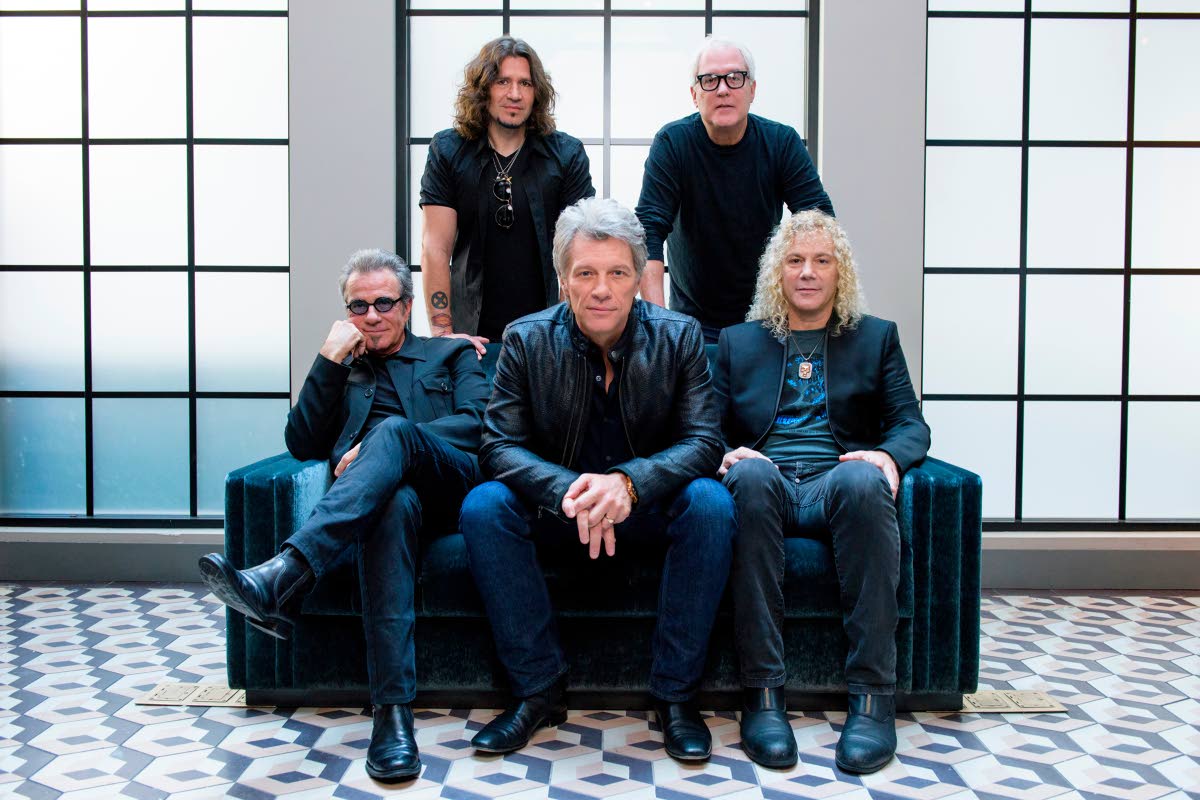 Members of Bon Jovi front row (from left), Tico Torres, Jon Bon Jovi, David Bryan, back row (from left), Phil X, and Hugh McDonald pose for a portrait in New York on October 19, 2016. 