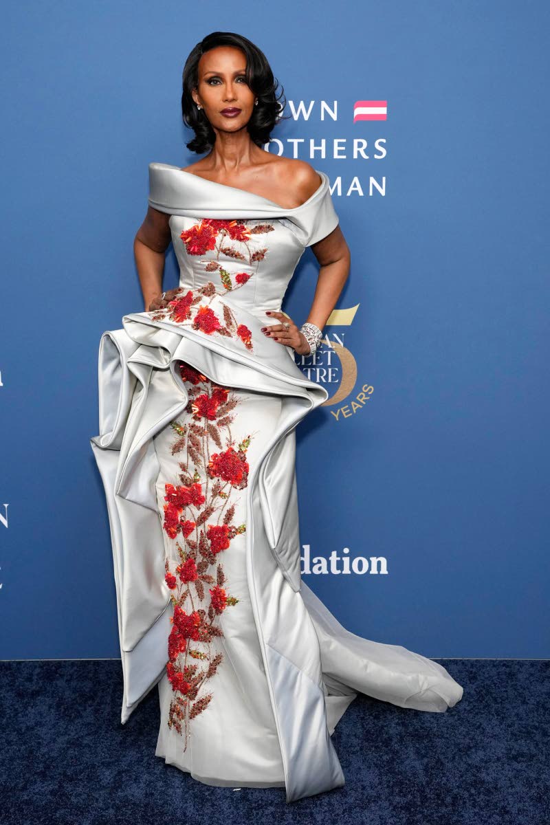 Iman’s Nardos Design silver sculptural gown with floral appliques and sleek bob is an ode to old Hollywood. 