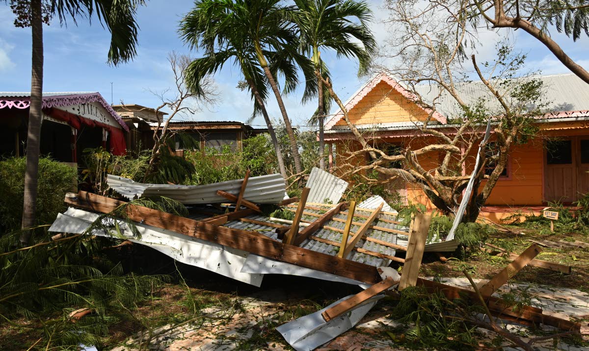 Hurricane Melissa left behind fallen trees and scattered roof debris at Jakes.