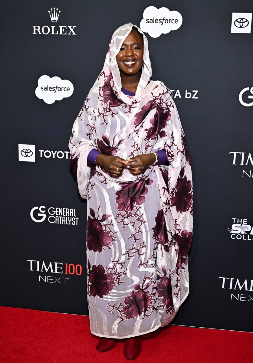 Poet, activist and UNHCR Goodwill Ambassador Emi Mahmoud is all smiles as she celebrates being named a TIME100 Next generation leader.