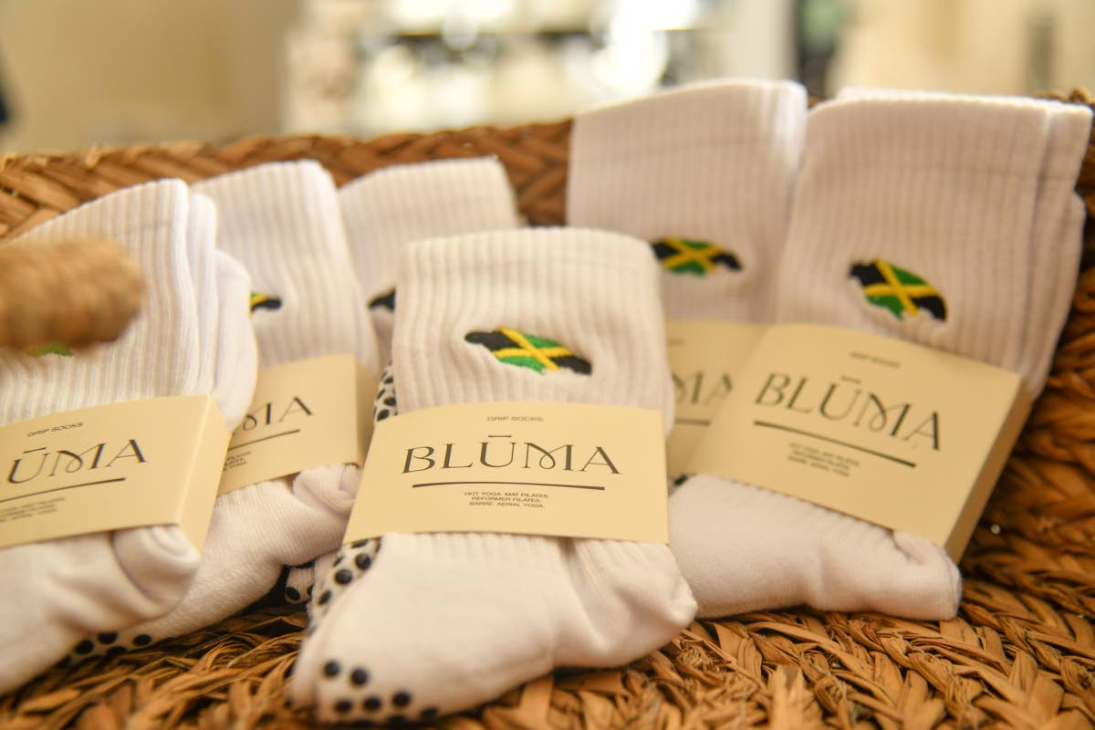 Comfy Blūma pilates socks, but make it Jamaican-inspired.