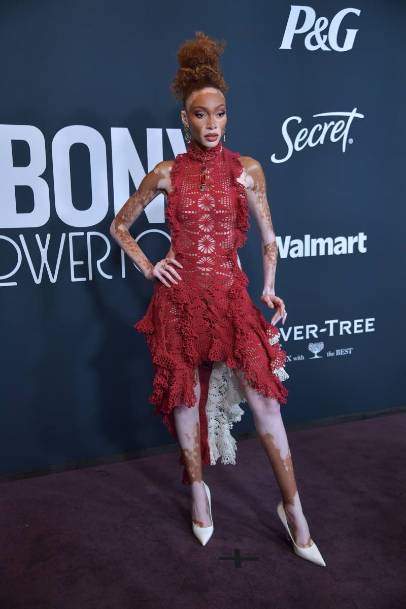 Winnie Harlow wears Rachel Scott’s Diotima, pairing it with white Louboutins.