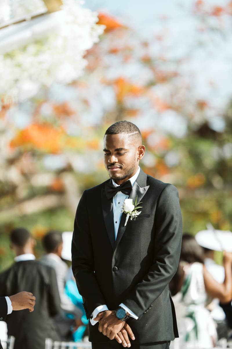 Richard Harris stands at the altar, full of excitement and anticipation, waiting for his beautiful bride.