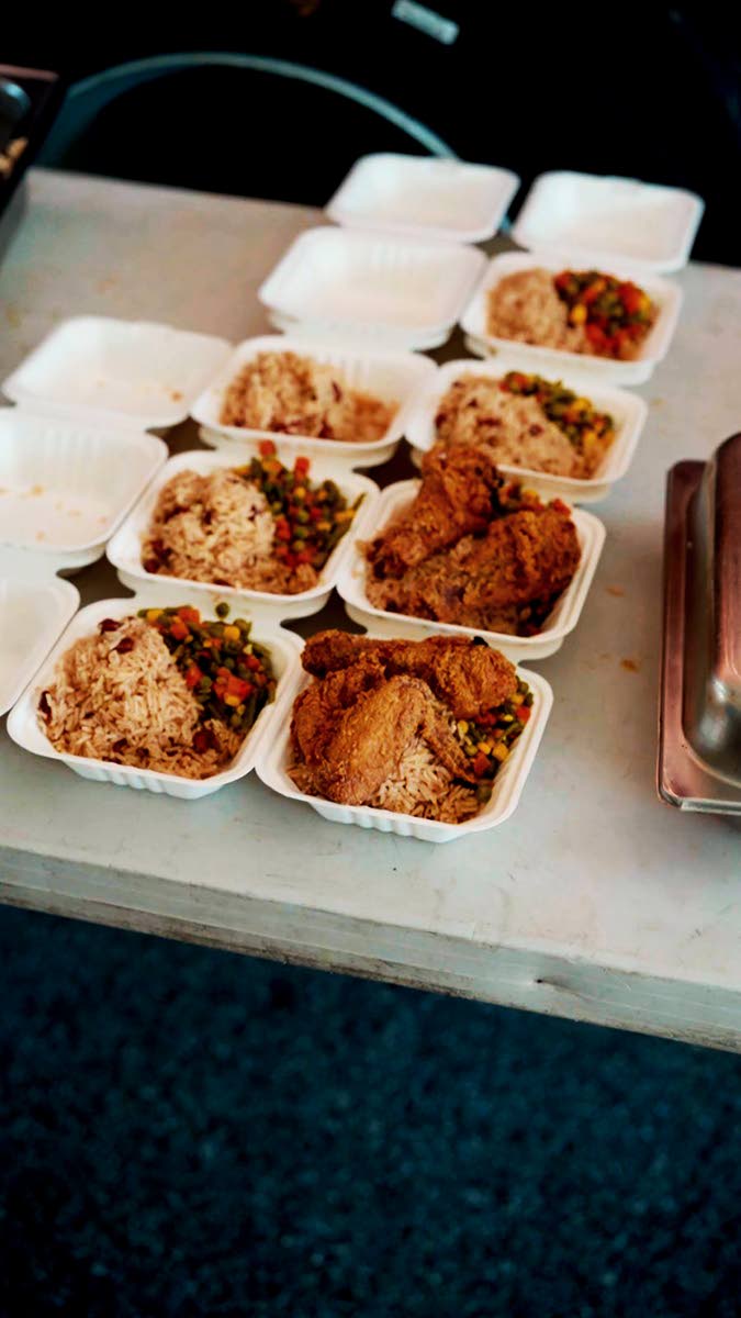 Servings of fried chicken meals with rice and peas, and vegetables to be dispatched to St Elizabeth.