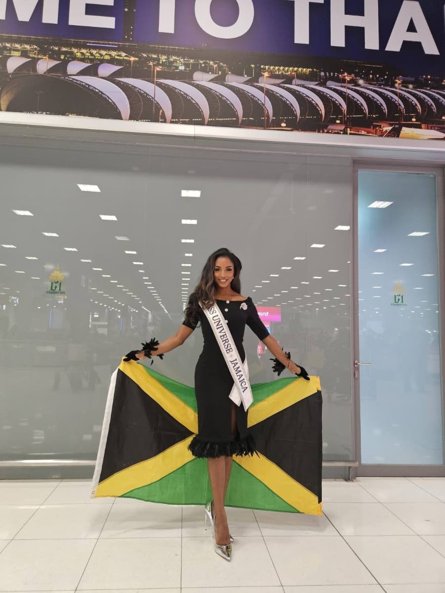 Henry is carrying the Jamaican flag with her.