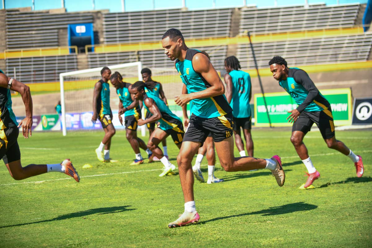 Jamaica's Reggae Boyz go through their drills during a training session on  Monday just ahead of today's World Cup Qualifier against Curacao.