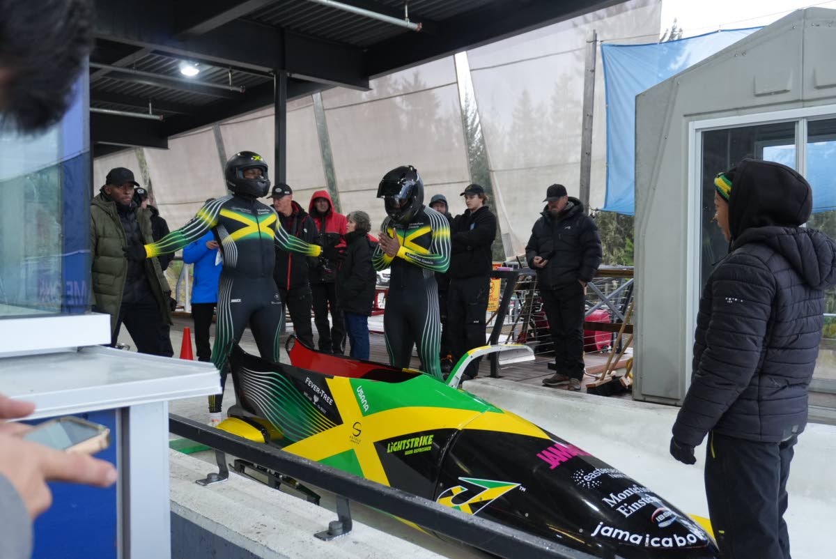 Jamaica’s bobsleigh team gets ready for one of their runs at the International Bobsleigh and Skeleton Federation North American Cup in Whistler, Canada.