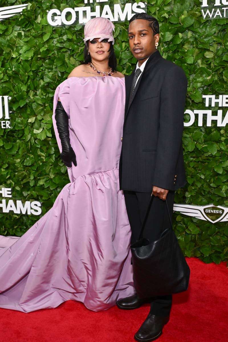 right: Rihanna (left), and partner A$AP Rocky. Rocky, the newly appointed brand ambassador for Chanel, is in a suit from the French luxury house.