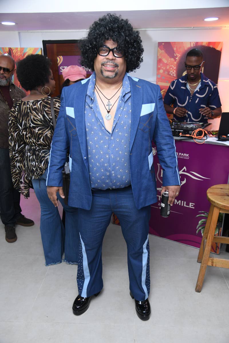 Far out! Gary Peart, executive chairman of Supreme Ventures Limited, channels disco vibes in a denim-on-denim look by local designer Carlton Brown.