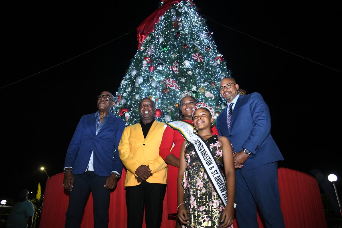 Marking the annual celebration of the Christmas tree-lighting ceremony are (from left) Custos of St Andrew Ian Forbes; Mayor of Kingston Andrew Swaby; Miss Kingston and St Andrew Festival Queen first runner-up, Johnique Francis; Little Miss Kingston and St