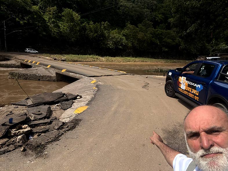 Chef Jose Andres, founder of the non-profit organisation World Central Kitchen takes in the sight of the iconic Flat Bridge post-Hurricane Melissa alongside his Ford Ranger XLT from KIG to traverse the terrain and reach those most in-need following Hurrica