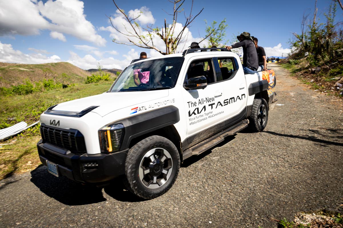 The all-new Kia Tasman stands on site at King’s Primary and Infant School in Longhill District, White House, Westmoreland, during the Kia Cares initiative. The pickup supported the day’s restoration activities, transporting tools and supplies as part o