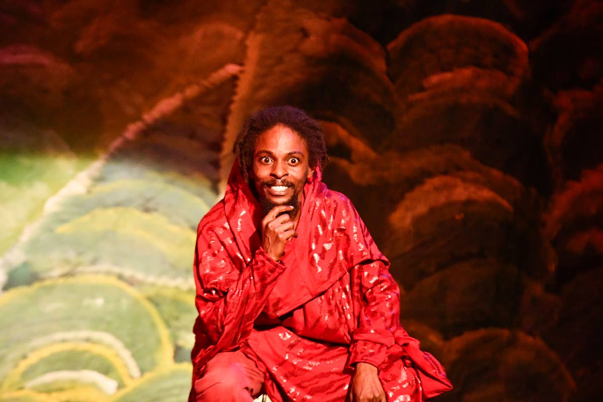 Derrick ‘Khafari’ Clarke, who plays ‘Lou’ in the 2024 national pantomime ‘Channel 876’ – a character plotting against the people of Harvest Mount – performs on opening night at the Little Theatre in St Andrew on December 26, 2024.