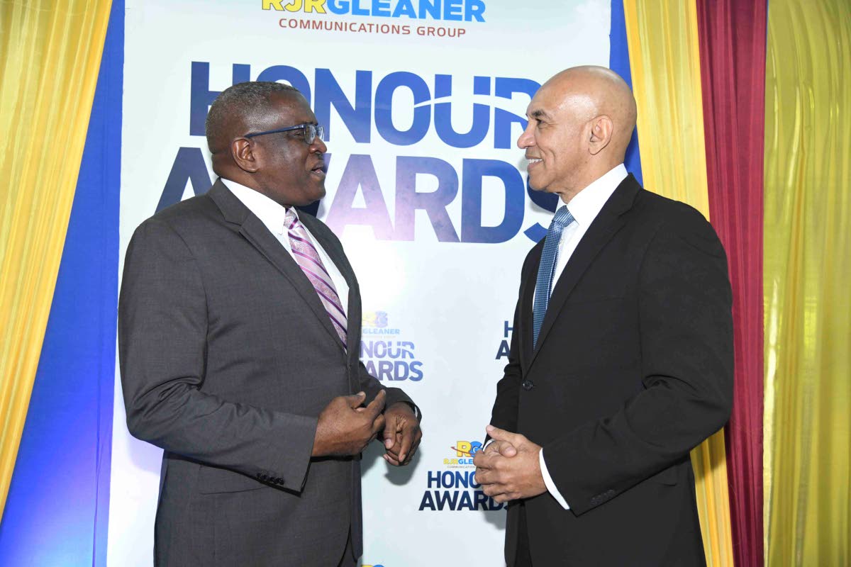 Anthony Smith (left), CEO at the RJRGLEANER  Communications Group, and Major General (rtd) Antony Anderson, Jamaica’s ambassador to the United States, at the RJRGLEANER Honour Awards ceremony held on July 1 at the TVJ studios. 
