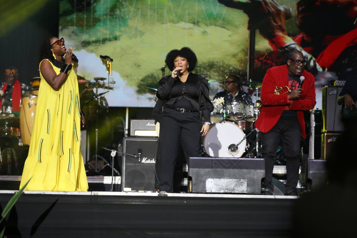 Lilty Cliff (centre), daughter of Jimmy Cliff, performing alongside Tammi T (left) and Dwight Richards.