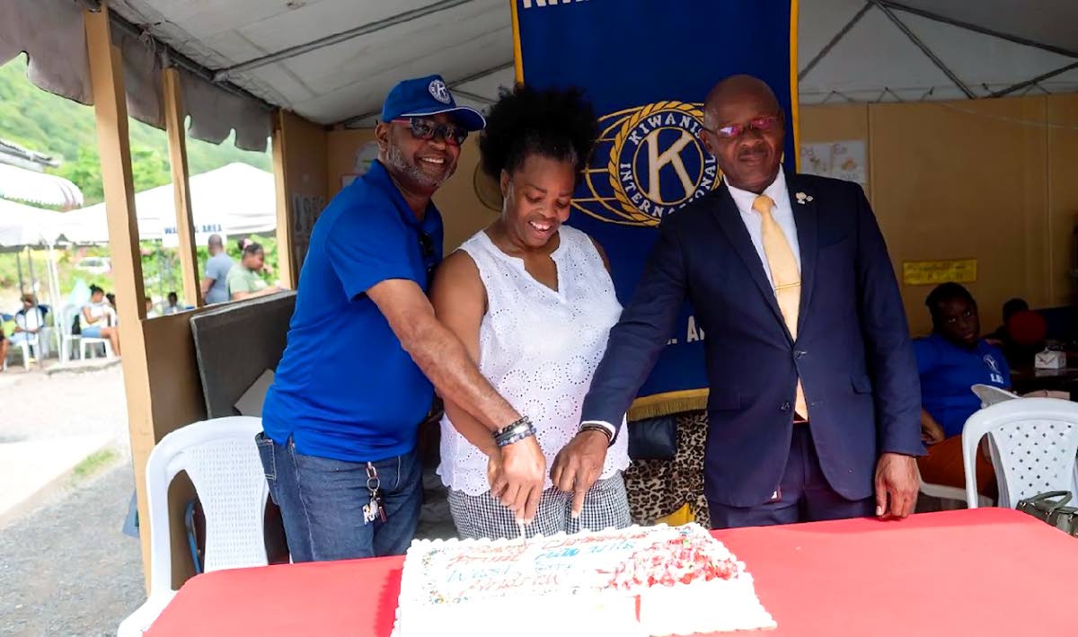  From left: President of the Kiwanis Club of West St Andrew, Maurice Livingston, Michelle Dixon, principal of Laura's Basic School, and Lieutenant Governor for Kiwanis International Michael Williams. 