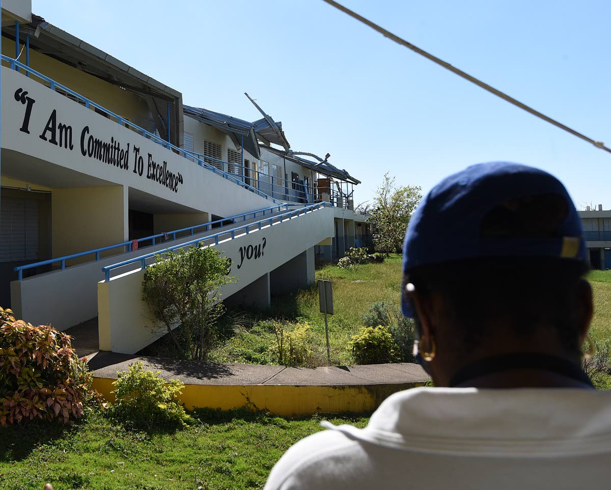 The roof on this block at Belmont Academy was ravaged by Hurricane Melissa.