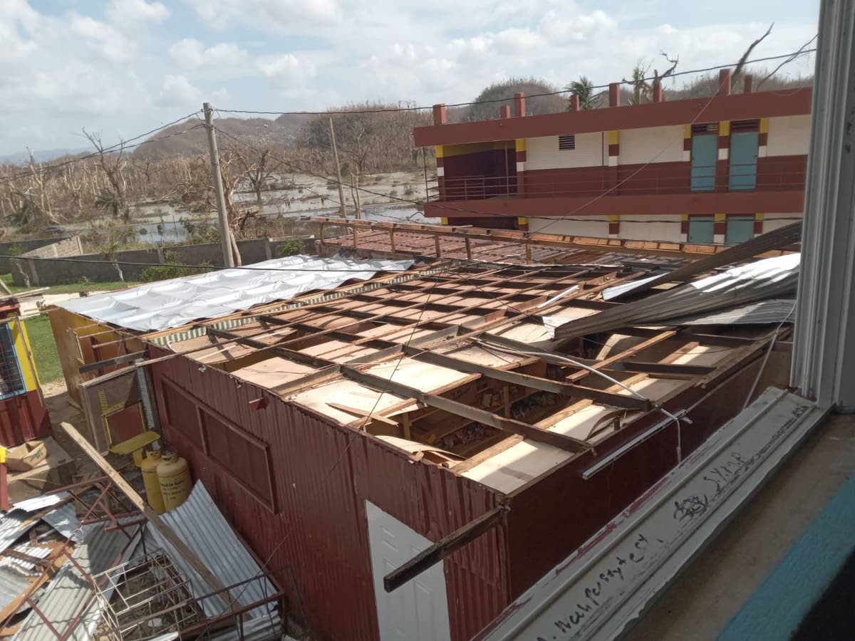 
A roofless block at Maggotty High School.