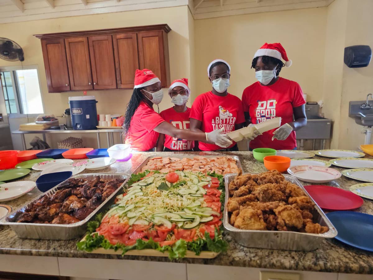 CB Group’s ‘Do Good Crew’ team gets ready to serve meals at the Hanover Infirmary.