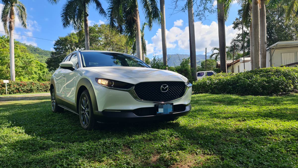 The elegant sweep of the Kodo design language is perfectly captured in this front three-quarter view, highlighting the slender LED headlamps and bold grille signature.