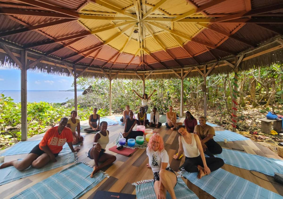 Mat and Flow participants were led through an Align and Amplify session by founder Iyla Cousins (standing), at the Great Huts Eco Resort on December 20.