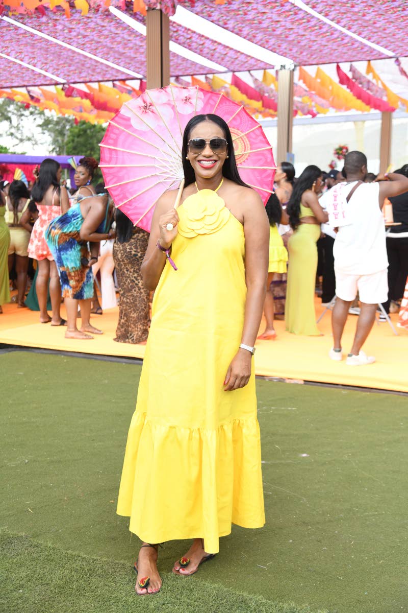 Rhoda Moy Crawford, minister of state in the Ministry of Education, Skills, Youth, and Information, steps out in a radiant sundress complete with a delicate flower detail that adds a subtle touch of personality.