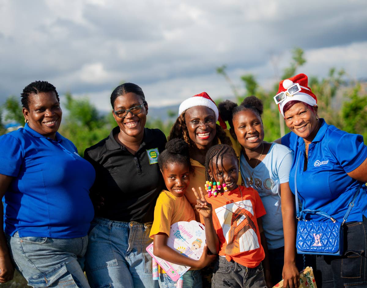 From left: Cassitta McKenzie, Musson Group volunteer; Vanessa Nelson, project and programme coordinator, Seprod Foundation; Jennifer Small, director, Jenny Jenny Foundation; and Marcia Hall, Musson Group volunteer share smiles during the Crawford Primary S