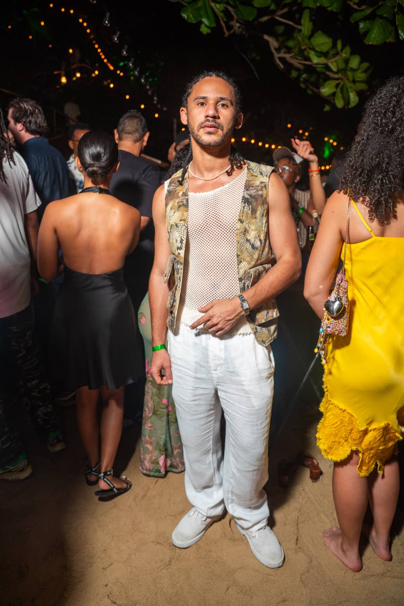 Recording Artiste Tessellated strikes a casual cord at Forward in a tank and camo vest from Tribe Nine Studios.