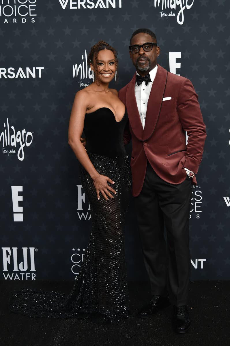 Ryan Michelle Bathe and husband Sterling K. Brown arrive at the 31st Annual Critics Choice Awards on Sunday, at The Barker Hanger in Santa Monica, California.