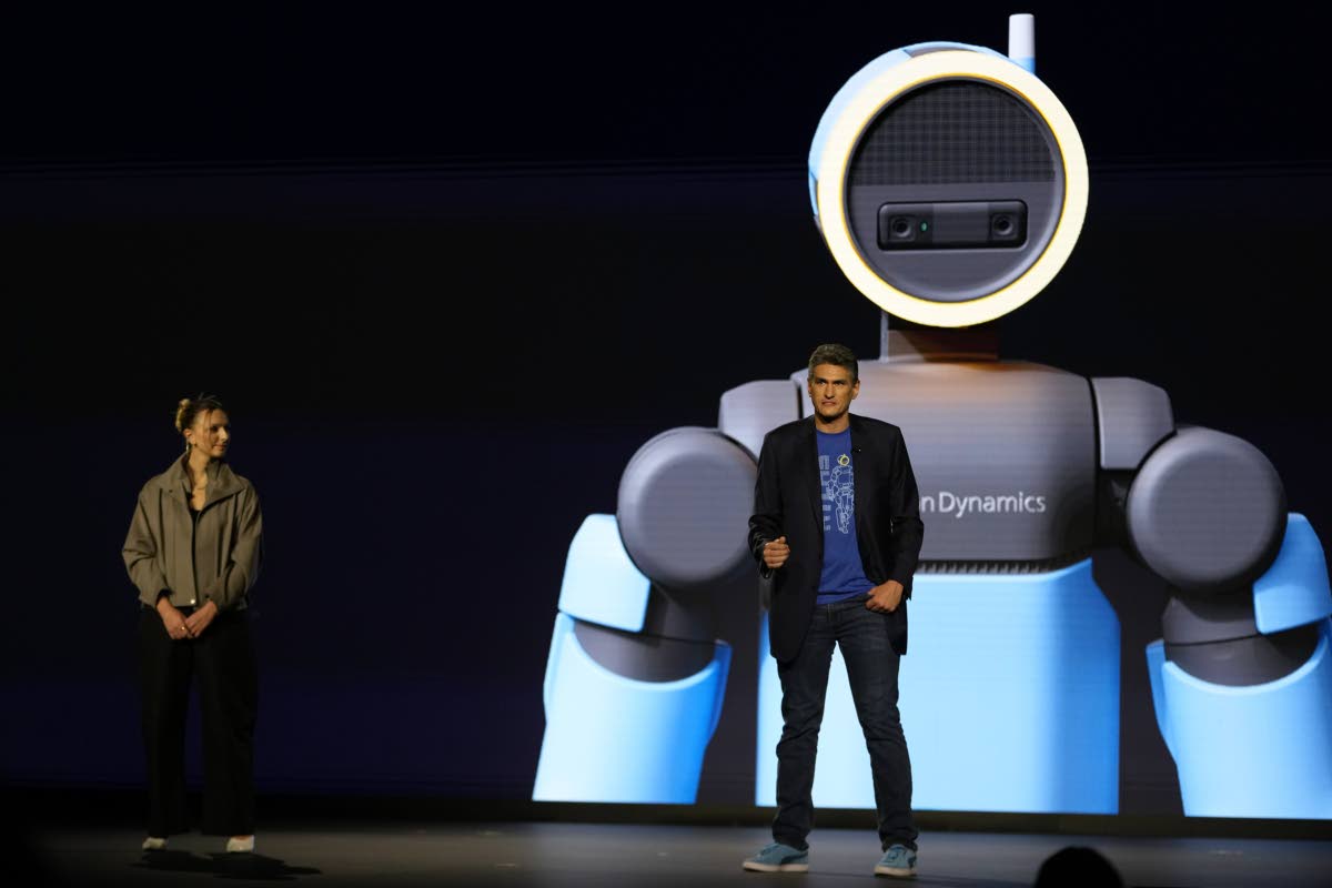 Humanoid application product lead at Boston Dynamics, Aya Durbin (left), and Vice-President and General Manager of Atlas at Boston Dynamics, Zachary Jackowski, talk during a Hyundai and Boston Dynamics news conference ahead of the CES tech show on Monday, 