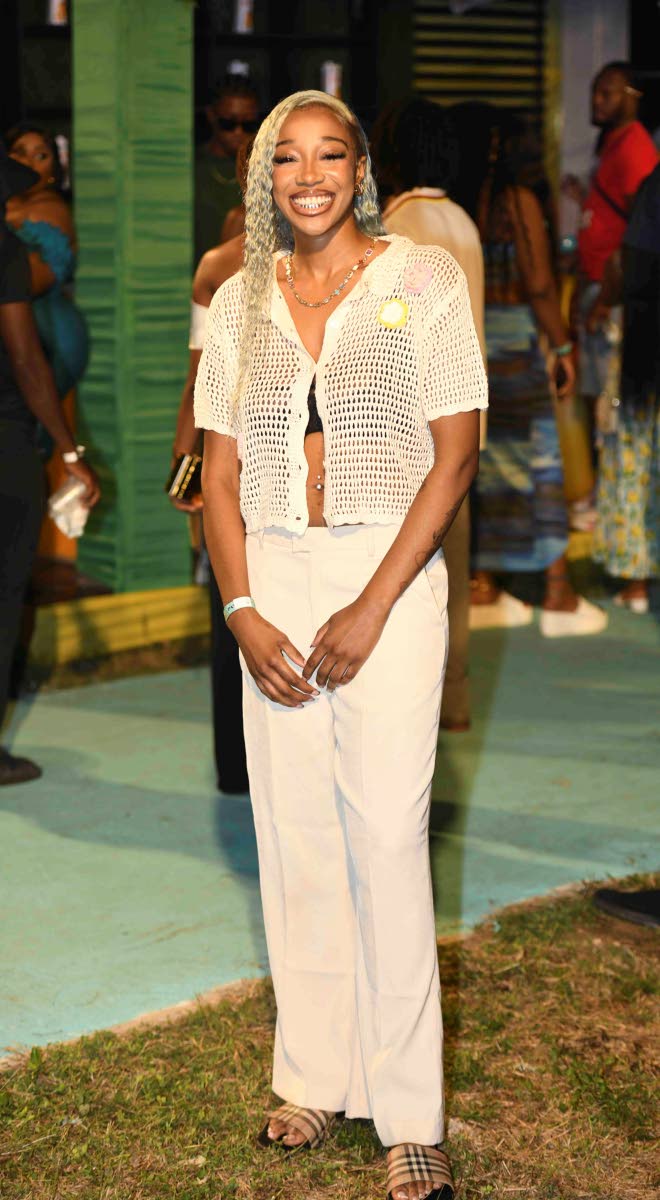 UK rapper Wohdee brought relaxed elegance to Zimi Seh Brunch, opting for an all-white ensemble that balanced laid-back cool with island style.